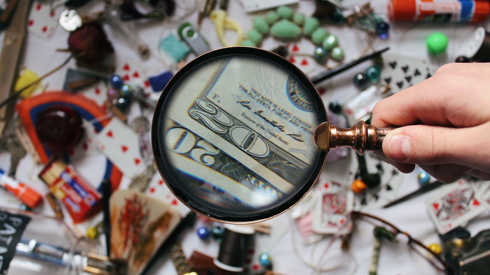 Close-up of a magnifying glass, symbolizing closer examination